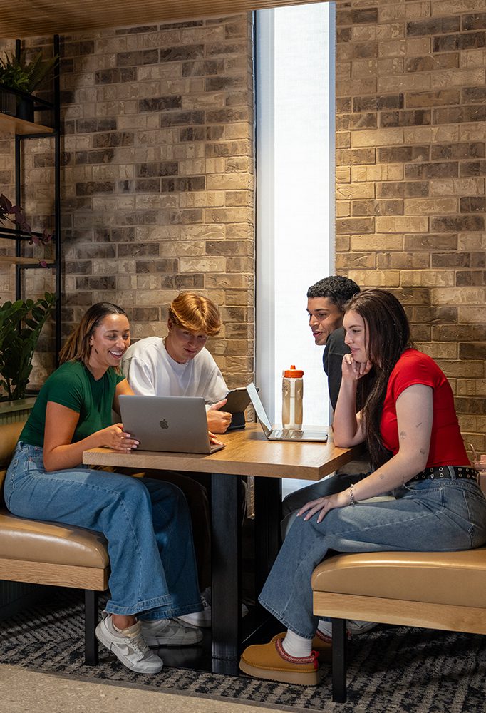 a group of friends studying