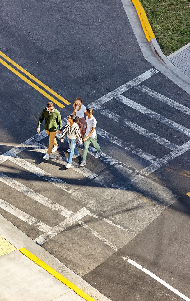 friends crossing the street