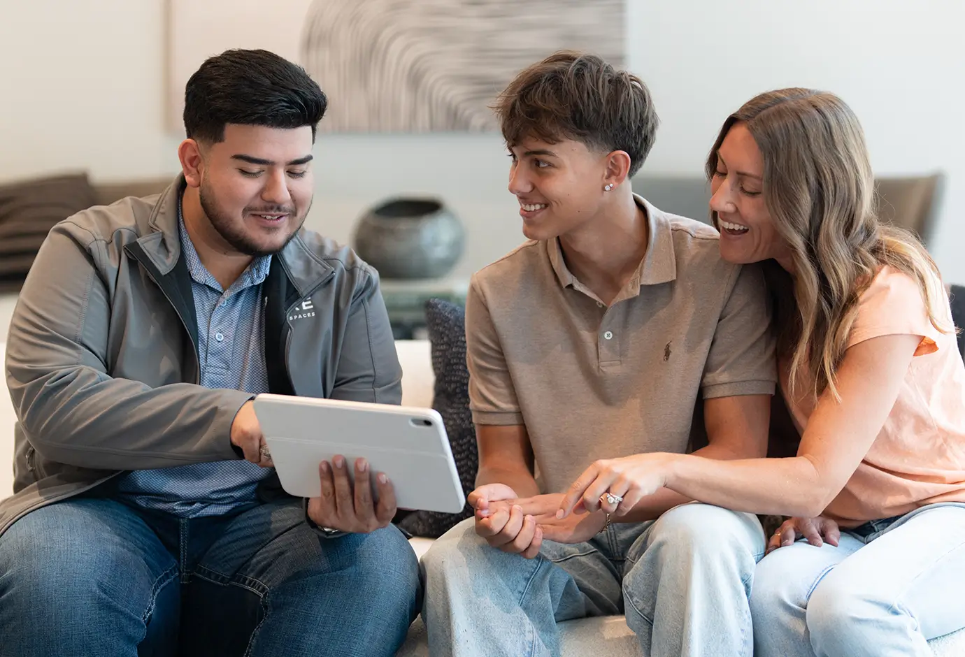 family looking over a tablet